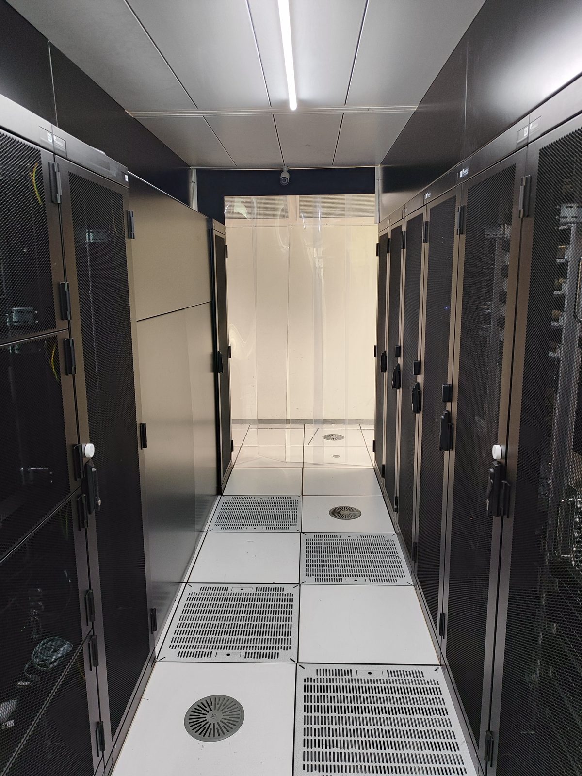 View of the cold corridor in the AlpineDC datacenter in Lausanne